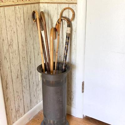 LOT 177: Brass Cane / Umbrella Holder with Collection of Wooden Canes