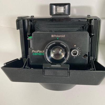 LOT 179: Vintage Polaroid Collection - Pro Pack Camera, Supercolor 635CL and Film