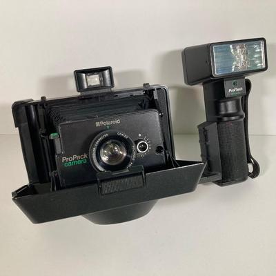 LOT 179: Vintage Polaroid Collection - Pro Pack Camera, Supercolor 635CL and Film