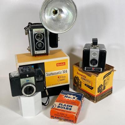LOT 180: Vintage Cameras - Kodak Instamatic M4, Brownie Hawkeye, Duaflex III, Revere Automatic 500, Westinghouse No. 5 Flash Bulbs and More