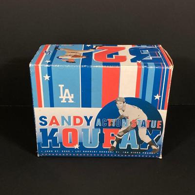 LOT 184: Brooklyn Dodgers 1955 World Series vs New York Yankees Wall Art, Sandy Koufax Figurine in Original Box and Ken-Wel Brand Sign