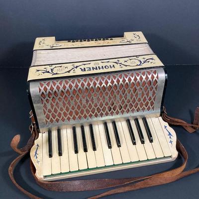 LOT 185: Vintage Hohner Accordion in Case