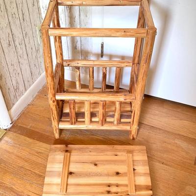 LOT 188: Handcrafted Log Style Side Table, Mountains / Cabin Wall Decor and Collection of Books