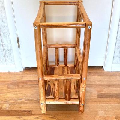 LOT 188: Handcrafted Log Style Side Table, Mountains / Cabin Wall Decor and Collection of Books