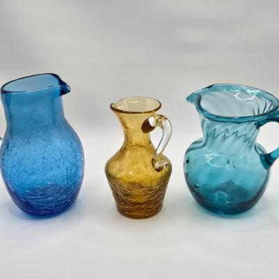 LOT 194: Beautiful Amber Glass Oversized Goblets and 3 Colored Glass Creamer/Syrup Pitchers