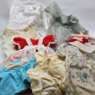 LOT 195: Small Vintage Dolls, Clothing, and Accessories