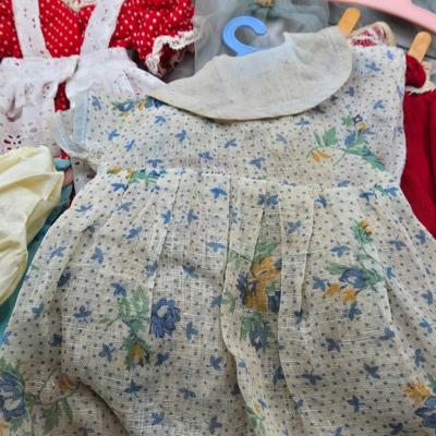 LOT 195: Small Vintage Dolls, Clothing, and Accessories