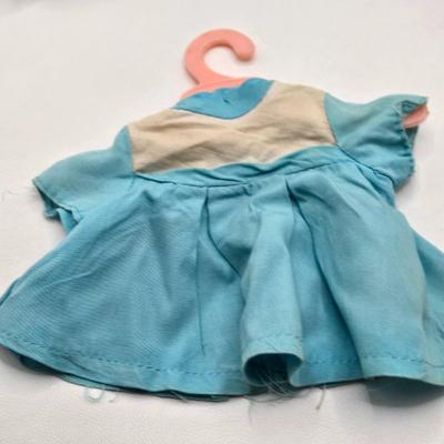 LOT 195: Small Vintage Dolls, Clothing, and Accessories