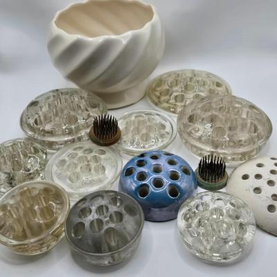 LOT 196: Multiple Glass and Metal Flower Frogs, 2 Planter Pots, and Watering Can with Seeds & Gloves