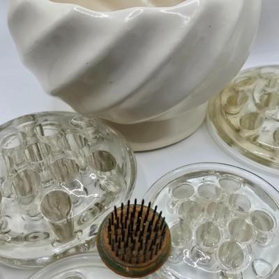 LOT 196: Multiple Glass and Metal Flower Frogs, 2 Planter Pots, and Watering Can with Seeds & Gloves