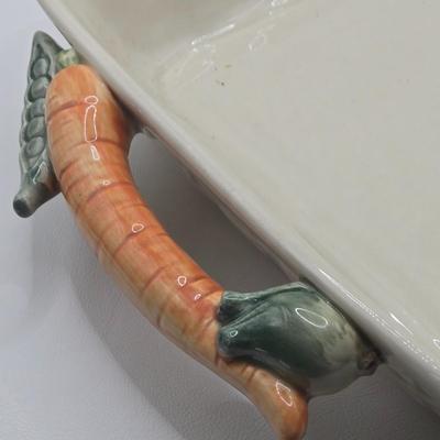 LOT 200: Cookbooks, Specialty Rolling Pins, Bundt Cake Pan, Handmade in Sweden Table Linen , Tile Trivet, Harkerware Serving Dish, and...