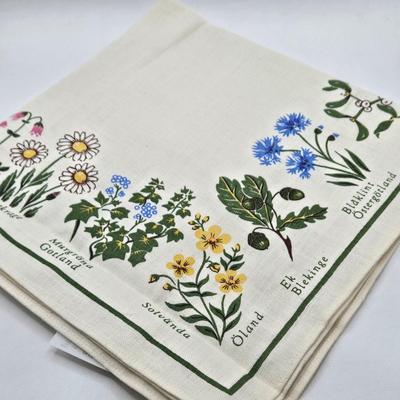 LOT 200: Cookbooks, Specialty Rolling Pins, Bundt Cake Pan, Handmade in Sweden Table Linen , Tile Trivet, Harkerware Serving Dish, and...