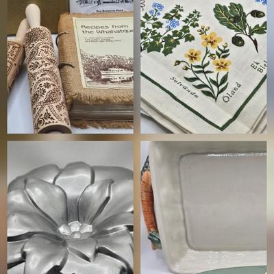 LOT 200: Cookbooks, Specialty Rolling Pins, Bundt Cake Pan, Handmade in Sweden Table Linen , Tile Trivet, Harkerware Serving Dish, and...