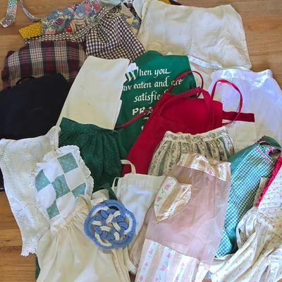 LOT 204: Vintage Aprons and Cookbooks