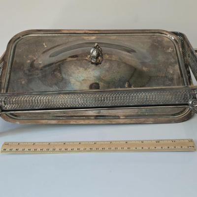 LOT 209: Formal Hostess Ware Including Encore Cake Stand, Silver-toned Candle Stick Holders, Footed Silver Plated Casserole Dish, and...