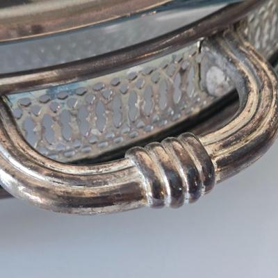 LOT 209: Formal Hostess Ware Including Encore Cake Stand, Silver-toned Candle Stick Holders, Footed Silver Plated Casserole Dish, and...