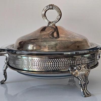 LOT 209: Formal Hostess Ware Including Encore Cake Stand, Silver-toned Candle Stick Holders, Footed Silver Plated Casserole Dish, and...