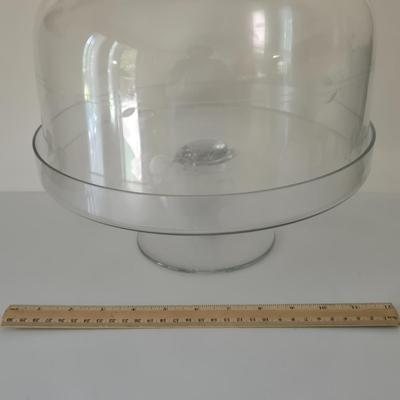 LOT 209: Formal Hostess Ware Including Encore Cake Stand, Silver-toned Candle Stick Holders, Footed Silver Plated Casserole Dish, and...