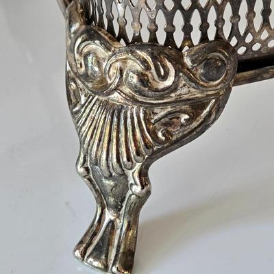 LOT 209: Formal Hostess Ware Including Encore Cake Stand, Silver-toned Candle Stick Holders, Footed Silver Plated Casserole Dish, and...