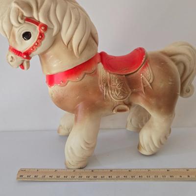 LOT 210: Edward Mobley Co. Arrow Rubber Corp. Horse Pony Squeak Toy, Fisher Price Molly Moo Cow, Handcrafted Wooden Toy Horse, and...