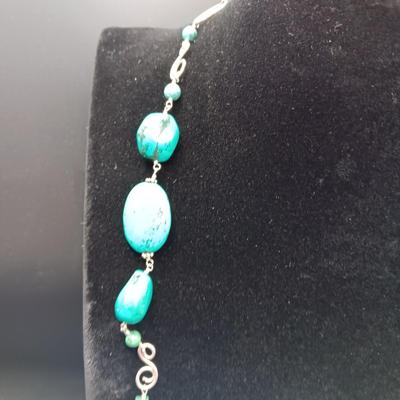 LONG GENUINE TURQUOISE NECKLACE WITH STERLING SILVER ACCENTS MARKED KL