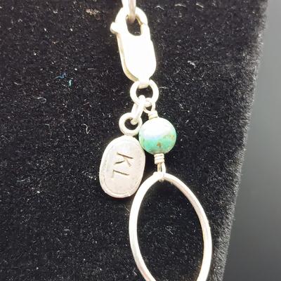 LONG GENUINE TURQUOISE NECKLACE WITH STERLING SILVER ACCENTS MARKED KL