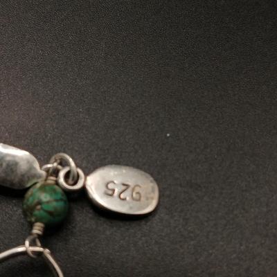 LONG GENUINE TURQUOISE NECKLACE WITH STERLING SILVER ACCENTS MARKED KL