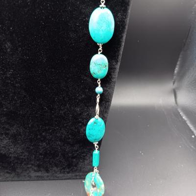 LONG GENUINE TURQUOISE NECKLACE WITH STERLING SILVER ACCENTS MARKED KL