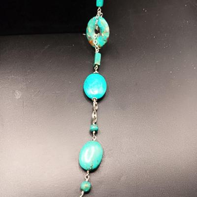 LONG GENUINE TURQUOISE NECKLACE WITH STERLING SILVER ACCENTS MARKED KL