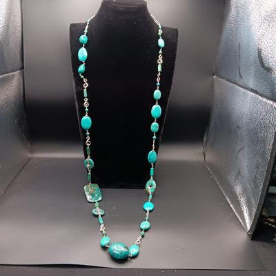LONG GENUINE TURQUOISE NECKLACE WITH STERLING SILVER ACCENTS MARKED KL