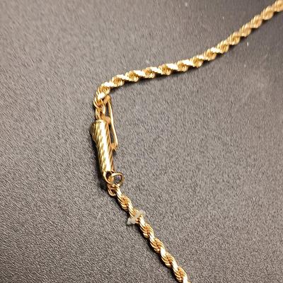 10K GOLD GARNET AND DIAMOND CROSS W/10K CHAIN PLUS A 10K RING WITH DIAMONDS 8.43g SIZE 7 1/2