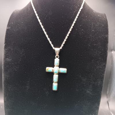 STERLING SILVER AND TURQUOISE CROSS ON A STERLING CHAIN