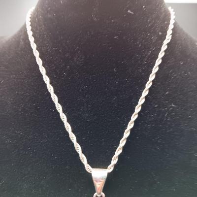 STERLING SILVER AND TURQUOISE CROSS ON A STERLING CHAIN