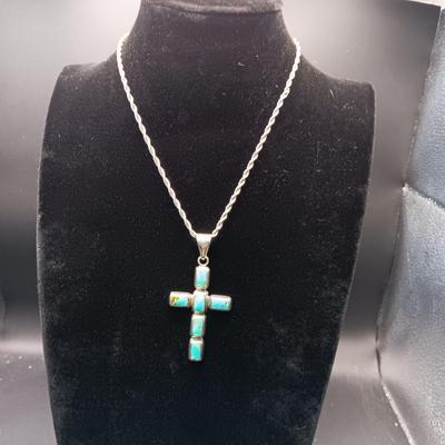 STERLING SILVER AND TURQUOISE CROSS ON A STERLING CHAIN