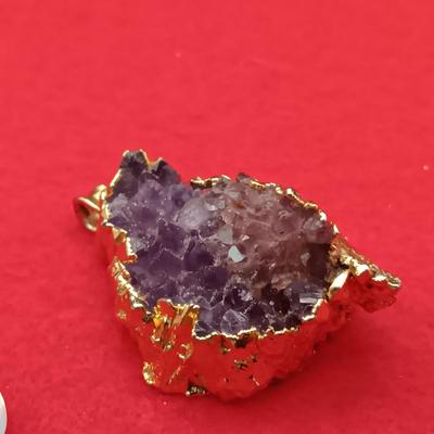 OPALINE EARRINGS AND AN AMETHYST CRYSTAL