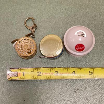 Fishing Reel, Hoover Vacuum & Retracting Vintage Tape Measure (BO-SS)