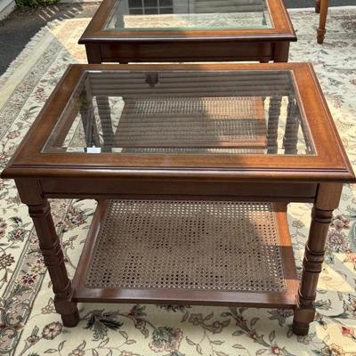 Two beautiful glass top caned tables
