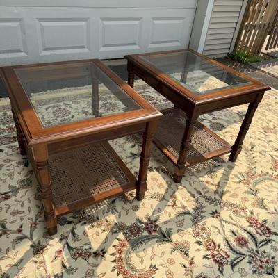 Two beautiful glass top caned tables