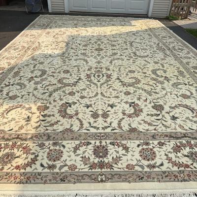 Large cream and green silk/wool rug