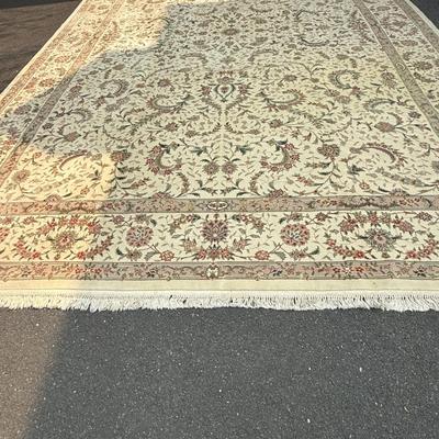 Large cream and green silk/wool rug