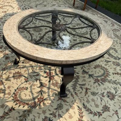 Travertine round glass top coffee table with wrought iron base (retailer for over $800!)