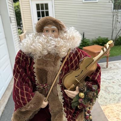 Santa with violin and Christmas plate