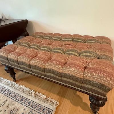 Two tufted ottomans with high end fabric that supplies Hermes!