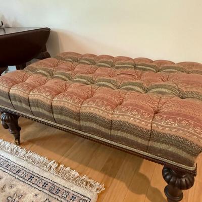 Two tufted ottomans with high end fabric that supplies Hermes!