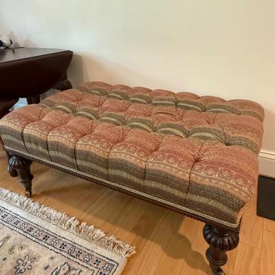 Two tufted ottomans with high end fabric that supplies Hermes!