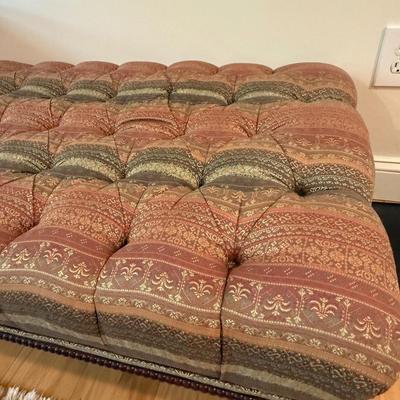 Two tufted ottomans with high end fabric that supplies Hermes!