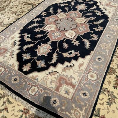 Navy blue and pink rug