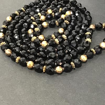 Beautiful vintage jet black faceted glass beaded long necklace