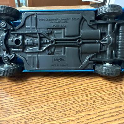 Sale Photo Thumbnail #27: Both on display at the ReStore 
Blue car is 1/24 scale. Back wheel pops off. 
1958 Danbury mint