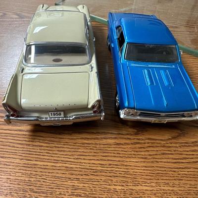Sale Photo Thumbnail #26: Both on display at the ReStore 
Blue car is 1/24 scale. Back wheel pops off. 
1958 Danbury mint